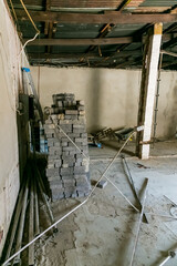 Inside interior of a small spaza shop grocery store undergoing renovation improvements in Soweto township