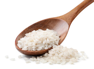 Raw rice in a wooden spoon on a white background. Isolated