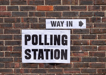 Sign indicating polling station for local elections.