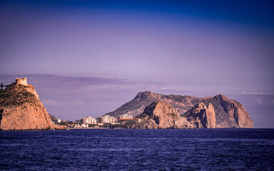 Coastline with castle on cliff, Aguilas, Spain