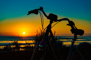 Bicycle on beach, active lifestyle.