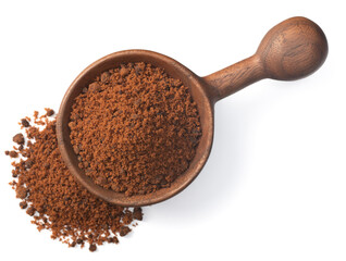 brown sugar in the wooden spoon, isolated on white background, top view