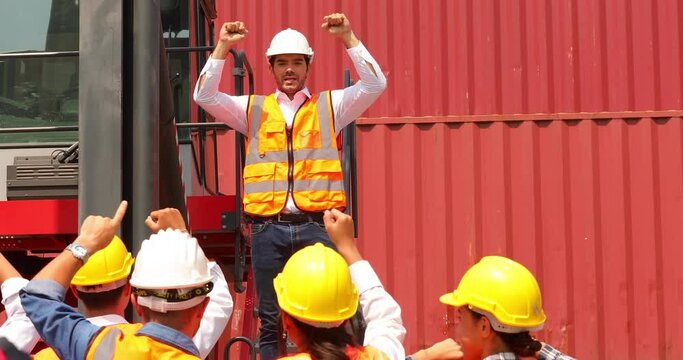 Hispanic man worker protest leader speaking with protester in workplace factory. Activist and leader