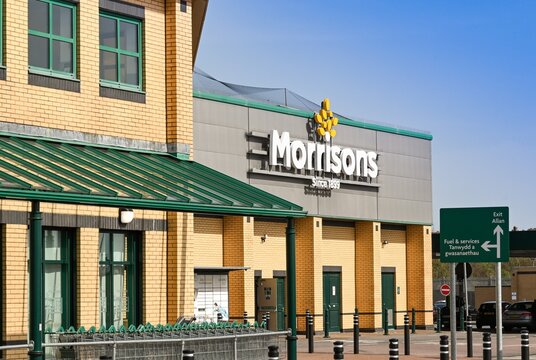 Barry, Wales - March 2021: Exterior view of the front of a branch of Morrisons supermarket in South Wales