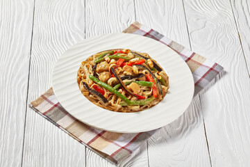 chicken satay rice noodle with veggies, top view