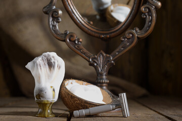 Metallic safety razor and shaving brush with shaving foam and coconut shell with decorative mirror...