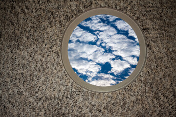 Soft Clouds on Blue Sky on the Window