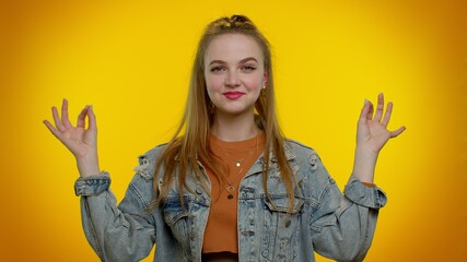 Keep calm down, relax, inner balance. Pretty stylish teen girl breathes deeply with mudra gesture,...