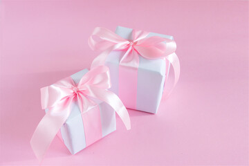 Gift box a pink background. Mother's day holiday concept. Copy space.