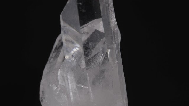 Rock Crystal quartz close-up isolated on a black background