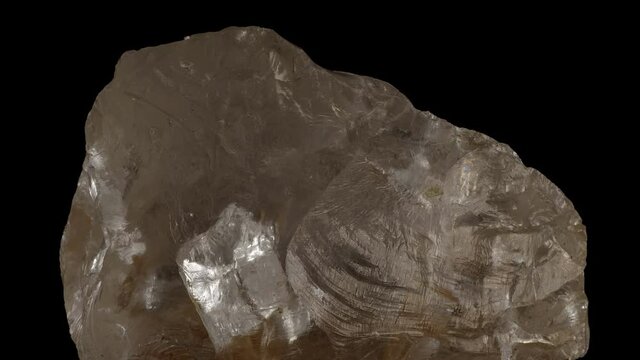 Rose Crystal Quartz close-up isolated on a black background