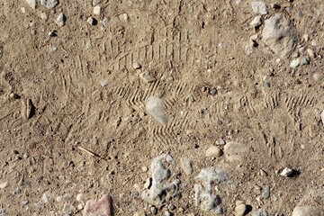 A close view of the dry dusty dirty on the ground surface.
