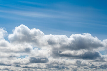 blue sky with light and dark clouds