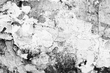 Texture of a concrete wall with cracks and scratches which can be used as a background