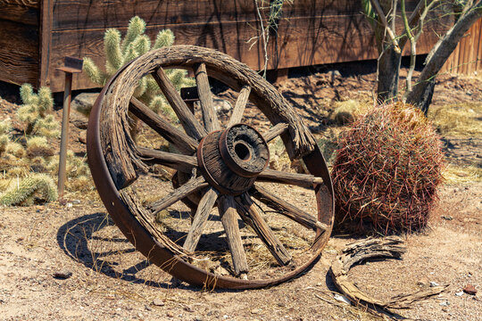 Wagon wooden wheel in a desert landscape