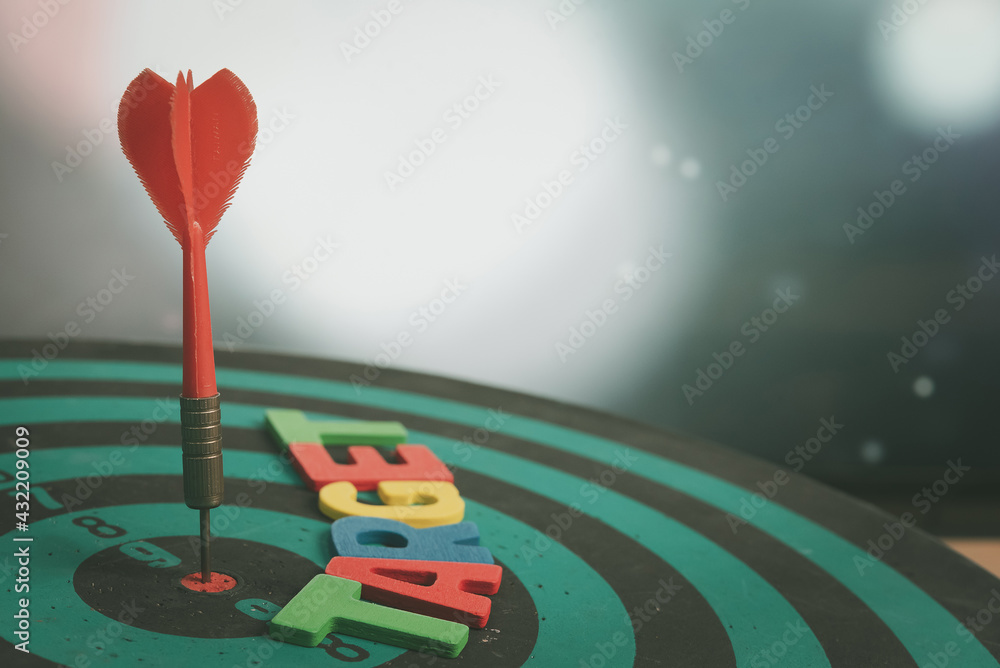 Poster bullseye is a target of business. dart is an opportunity and dartboard is the target and goal. so bo
