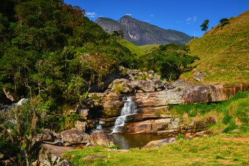 Fototapeta na wymiar The Cachoeira dos Frades waterfall on a sunny day in the beautiful Vale dos Frades, Teresópolis, Rio de Janeiro state, Brazil 