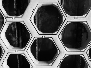 Abstract geometric background in the form of hexagons cut from a sheet of cement slab