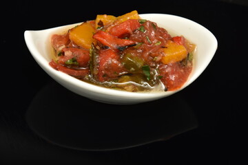 spicy sauce in a white bowl