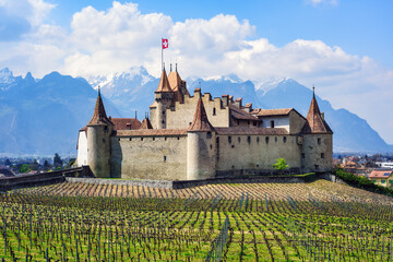 Aigle castle in swiss Alps mountains, Switzerland - obrazy, fototapety, plakaty