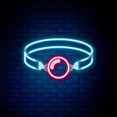 Glowing neon line Silicone ball gag with a leather belt icon isolated on brick wall background. Fetish accessory. Sex toy for men and woman. Colorful outline concept. Vector