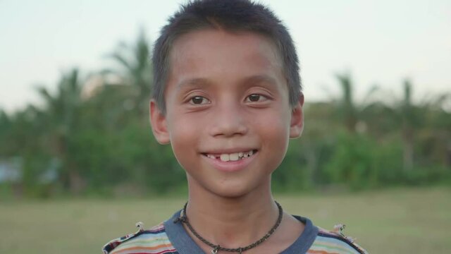 Poverty Boy Smiling, Slow Motion
