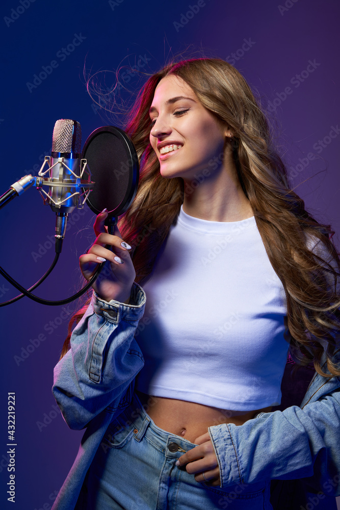 Canvas Prints Girl blogger recording audio podcast or singer