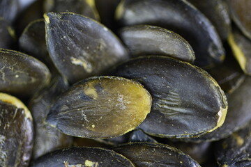 roasted salted pumpkin seeds, macro shot
