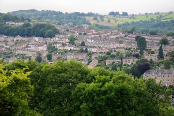 Fototapeta na wymiar The view over Bath, showing the variety of housing typical of Bath from the Bathampton village and civil parish east of Bath, Somerset, England, United Kingdom