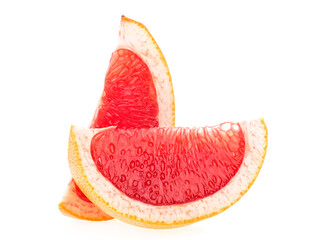Grapefruit slices isolated on a white background. Two pieces of fresh grapefruit.