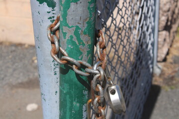 a padlock on the fence