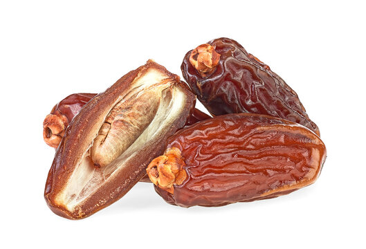 Dried date fruits isolated on a white background. Pile of dates, Arabic food. Mabroom dates.