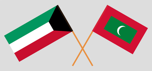 Crossed flags of Kuwait and Maldives. Official colors. Correct proportion