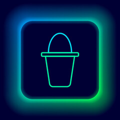 Glowing neon line Fishing bucket icon isolated on black background. Fish in a bucket. Colorful outline concept. Vector