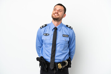 Young police Brazilian man isolated  on white background thinking an idea while looking up