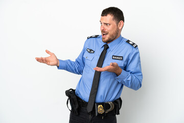 Young police Brazilian man isolated  on white background with surprise expression while looking side