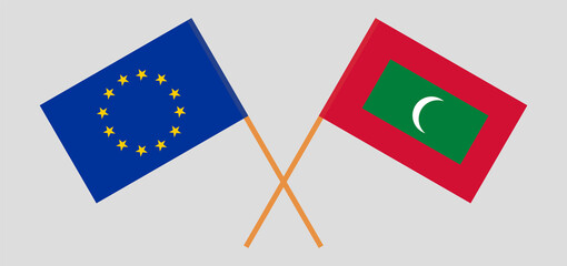 Crossed flags of the EU and Maldives. Official colors. Correct proportion