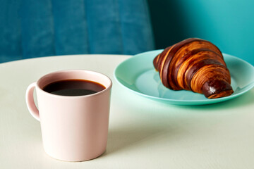 Classic breakfast French croissant and cappuccino, lifestyle
