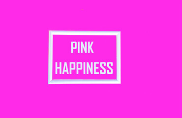 PINK HAPPINESS, text on a pink background in a silver frame