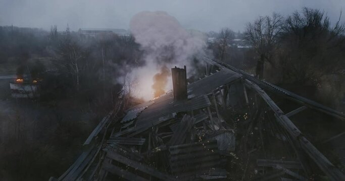 Explosion of an artillery shell from falling into an abandoned building which sheltered the military division. Time of day - morning, fog around. Concept: attack of militants on an opponent. 