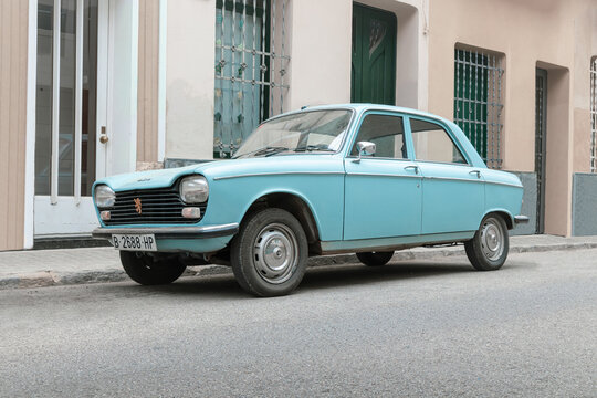 SABADELL, SPAIN-APRIL 9, 2021: 1965 Peugeot 204 Berline (aka sedan or saloon), designed by Battista Pininfarina