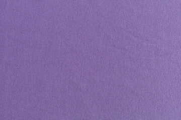 smooth surface of soft knitted fabric for sewing clothes in lilac color, background, texture