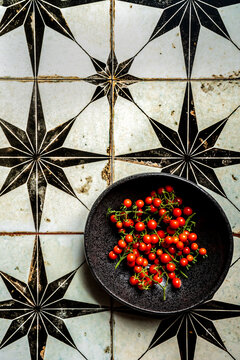 Pea sized tomatoes in bowl
