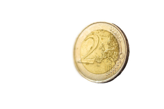 2 euro coin isolated on white background, close up picture. Super selective focus macro shot of a European currency. money concept with copy paste space.
