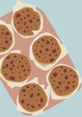 Chocolate chip cookies on the blue isolated background. Sweet pastries.