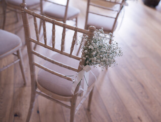 Wedding chiavari chair with gypsophila attached close up