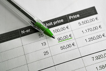 Invoice with a ballpen on the tabel, close up	