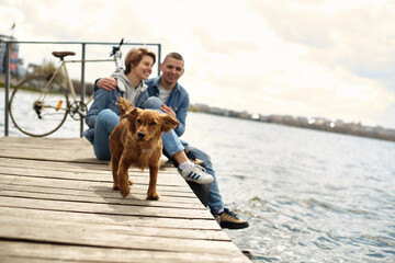 Young couple on the lake
