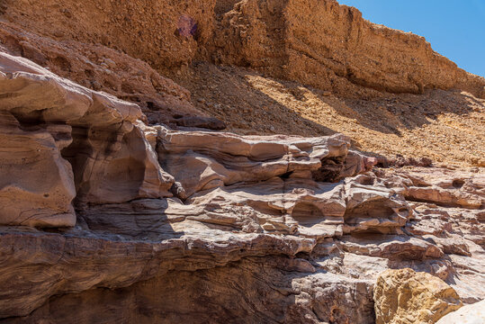 An amazing place in Israel is called the Red canyon and Nahal Shani, Southern District. Totally worth visiting because of its stunning stony structure. High quality photo