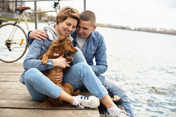 Young couple on the lake